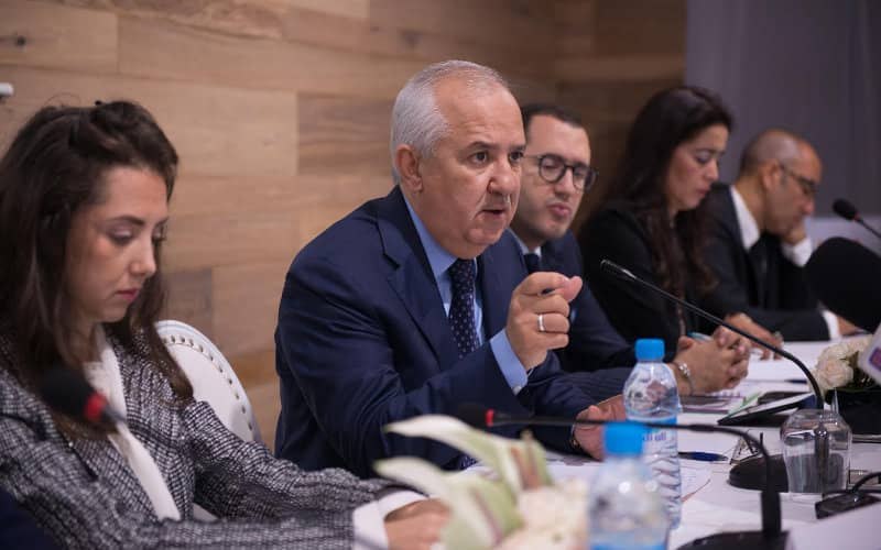 Anas Sefrioui addressing a press panel alongside Groupe Addoha executives